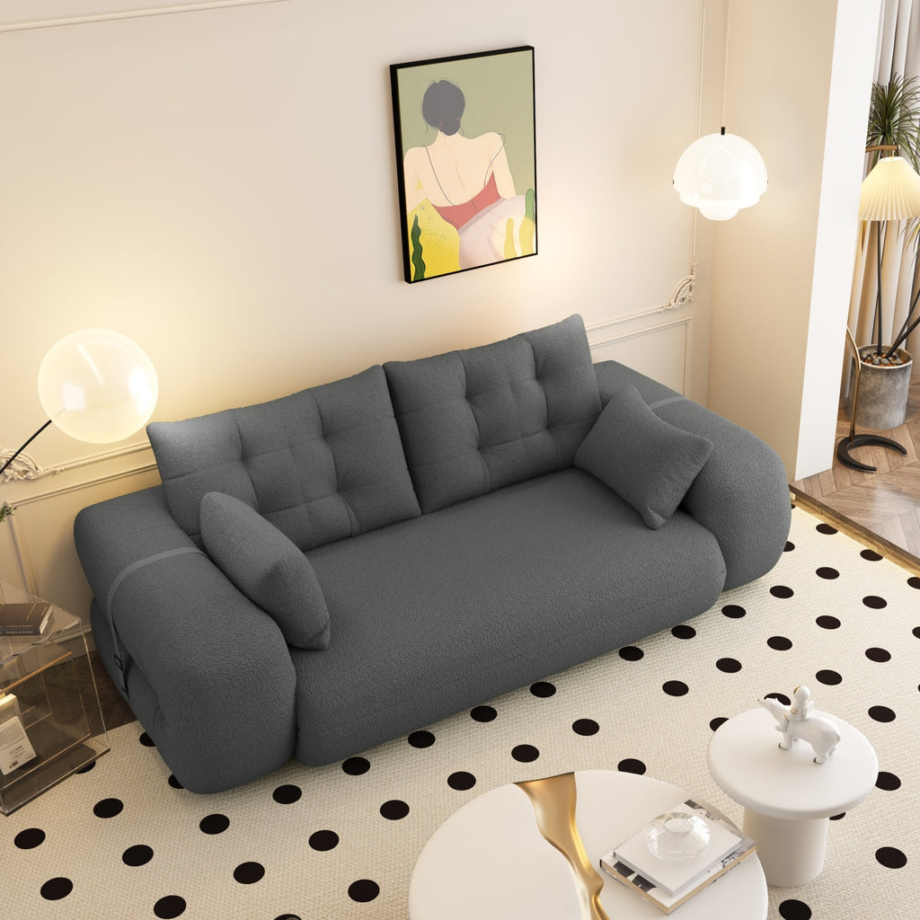 Anthony & Home Teddy Fabric Sofa Bed 3-in-1 studio showing a plush, tan-colored sofa bed with cushions and a modern design.