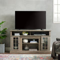 Anthony & Home gray wash finish TV media console with sleek design, featuring open shelving and storage compartments.