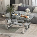 Anthony & Home tempered glass coffee table with a 6mm silver finish glass top and metal pedestal base in the exclusive collection.