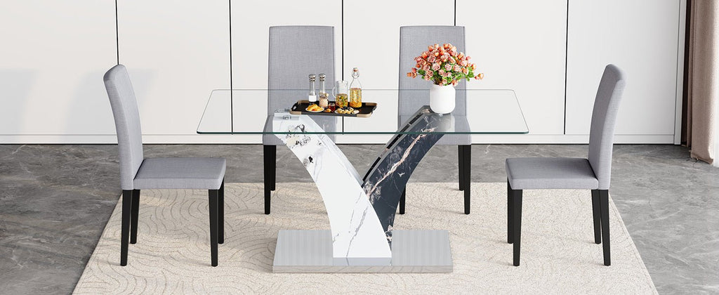 Anthony & Home tempered glass dining table and chair set in a modern studio setting, showcasing sleek design and contemporary style.