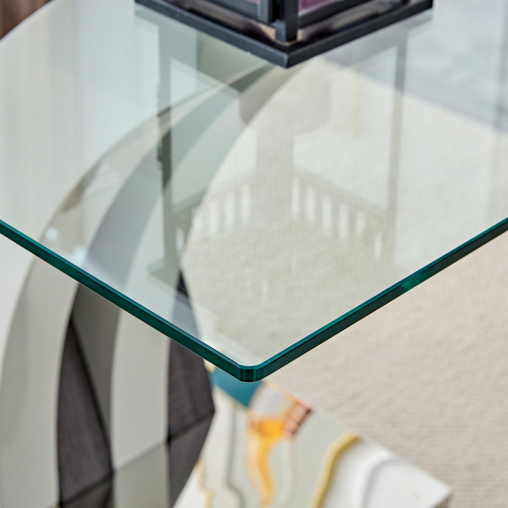 Tempered glass dining table with MDF legs from Anthony & Home Studio Collection, modern and sleek design.