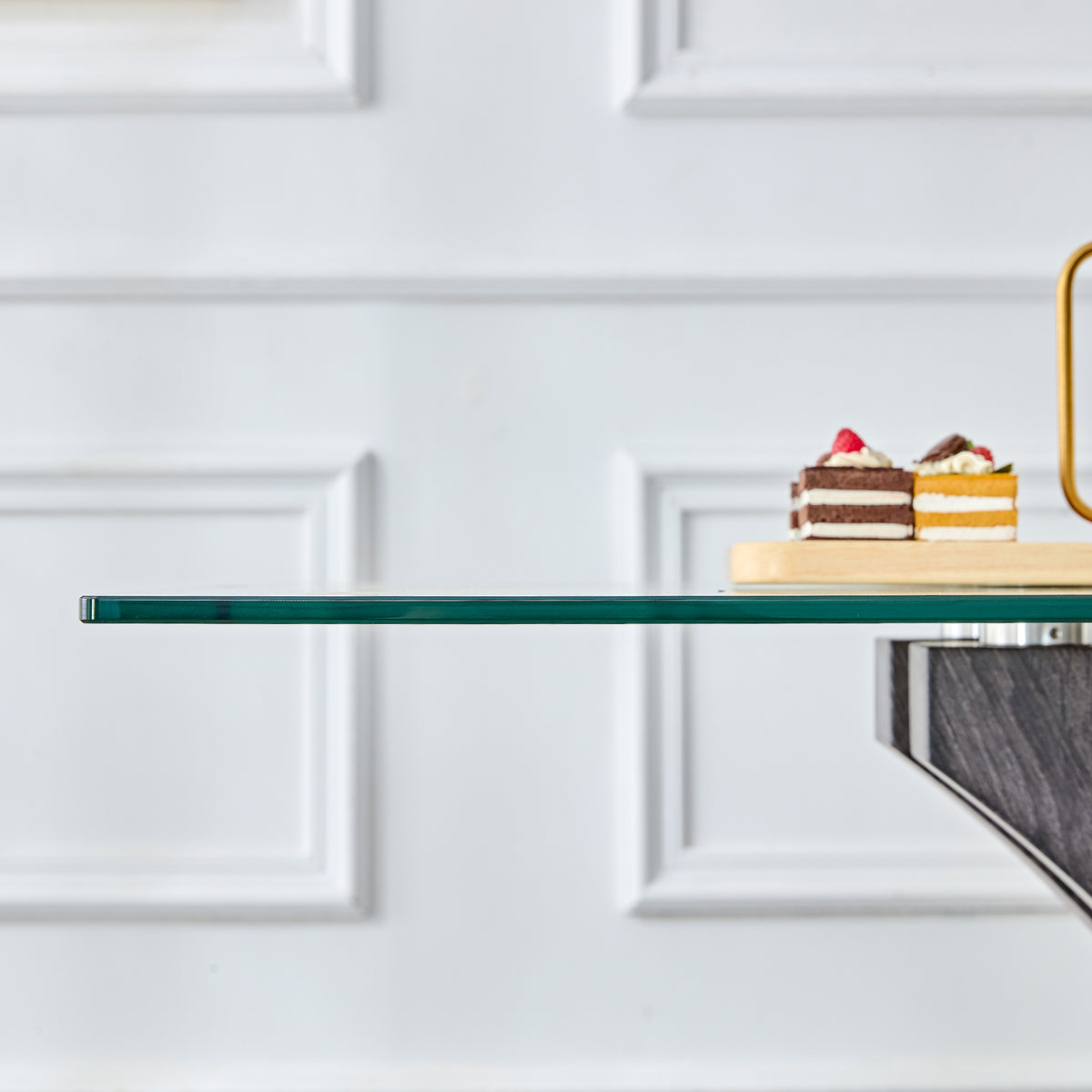 Anthony & Home tempered glass dining table with MDF legs from the Studio Collection, showcasing sleek, modern design.