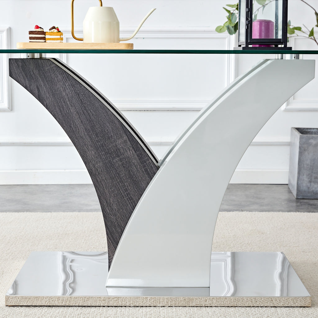 Tempered glass dining table with MDF legs from Anthony & Home Studio Collection, showcasing sleek glass surface and modern design.