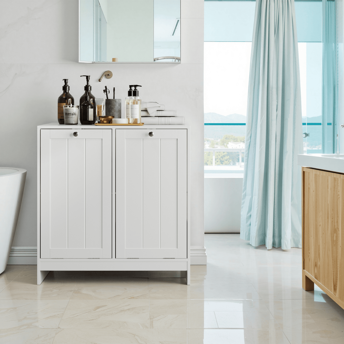 White lacquered tilted laundry hamper by Anthony & Home, limited edition with sleek modern design and sturdy structure.