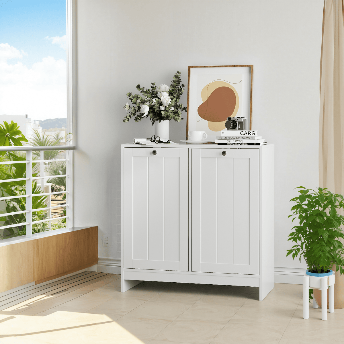 Lacquered white tilted laundry hamper by Anthony & Home with a sleek, modern design and limited edition finish.