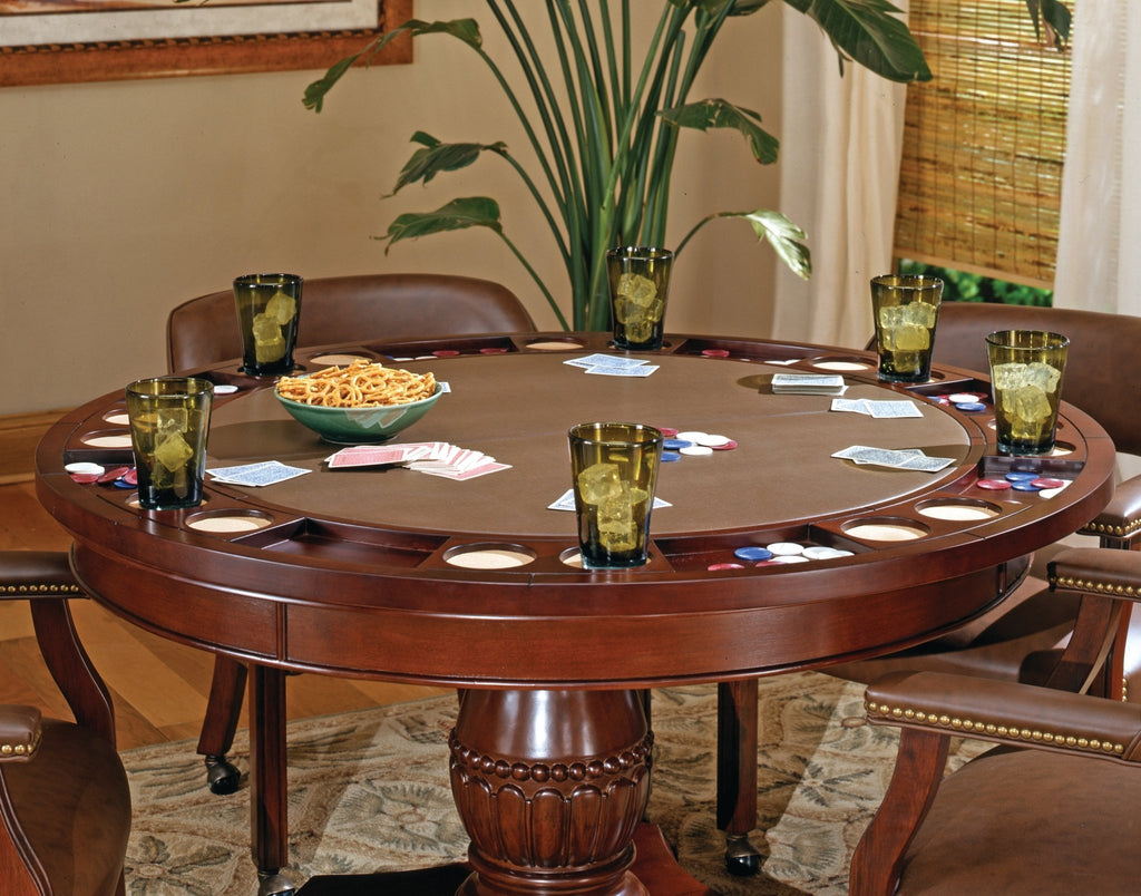 Dark brown fabric traditional arm chair with casters and beaded pedestal from Anthony & Home's Atelier Collection.