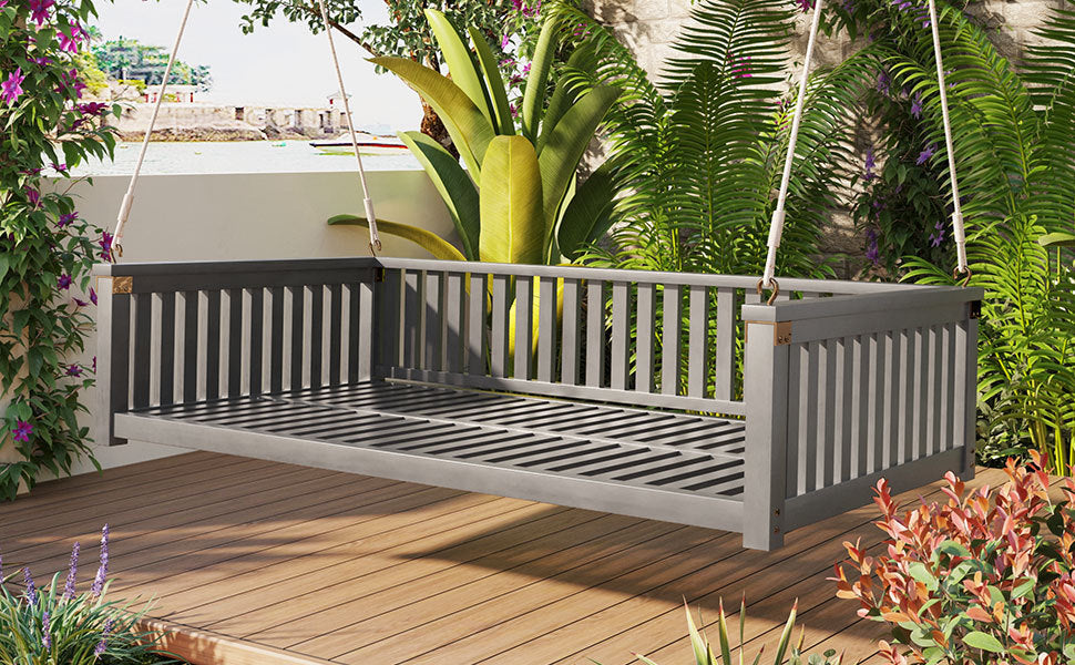 Twin size solid wood garden swing bed with rope support by Anthony & Home, featuring a cozy outdoor relaxation space.