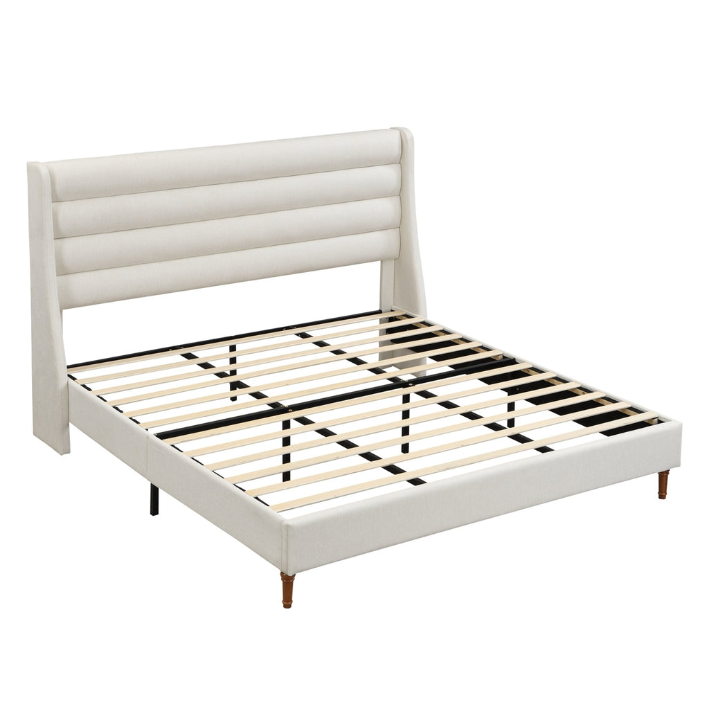 Upholstered bed frame with wave-shaped headboard from Anthony & Home's Exclusive Collection, featuring soft fabric and modern design.