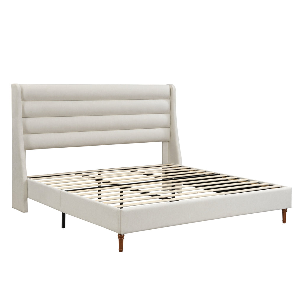 Upholstered bed frame with wave-shaped headboard from Anthony & Home's Exclusive Collection, featuring soft fabric and modern design.