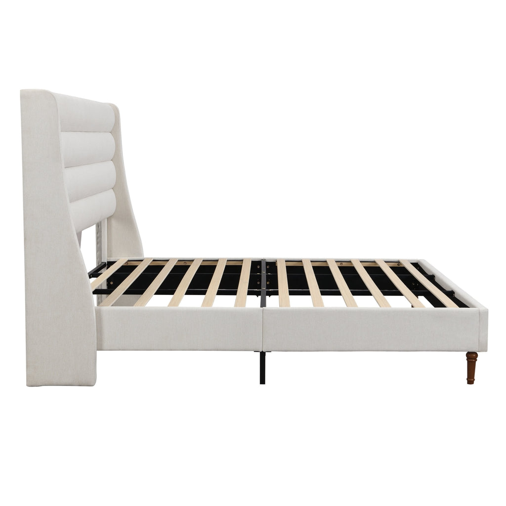 Upholstered bed frame with wave-shaped headboard from Anthony & Home's Exclusive Collection, showcasing plush fabric and modern design.