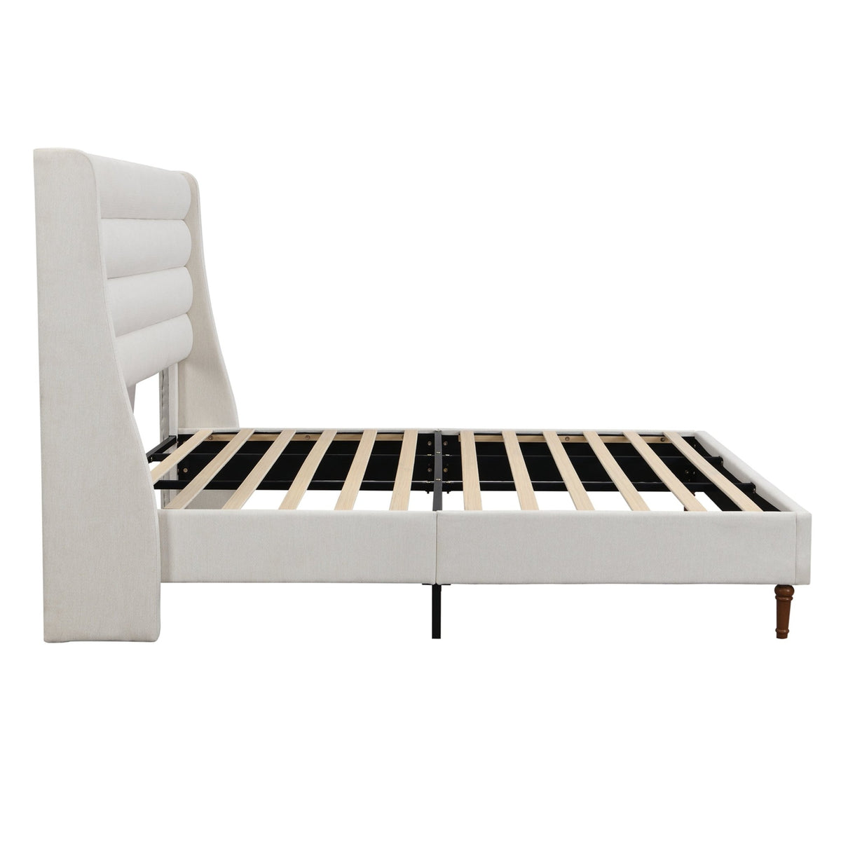 Upholstered bed frame with wave-shaped headboard from Anthony & Home's Exclusive Collection, showcasing plush fabric and modern design.