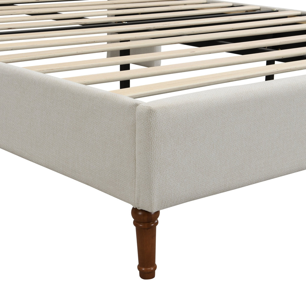 Upholstered bed frame with wave-style headboard from Anthony & Home's Exclusive Collection, featuring soft fabric and modern design.