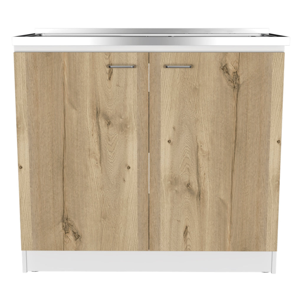 Stainless steel utility sink on a countertop, designed for studio or commercial use, by Anthony & Home.