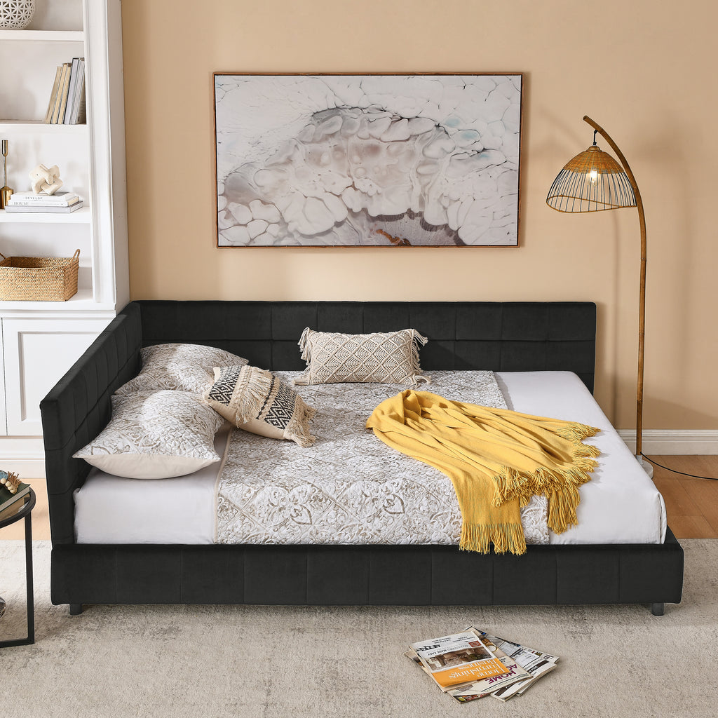 Velvet queen bed frame with tufted backrest in a modern studio setting, by Anthony & Home.