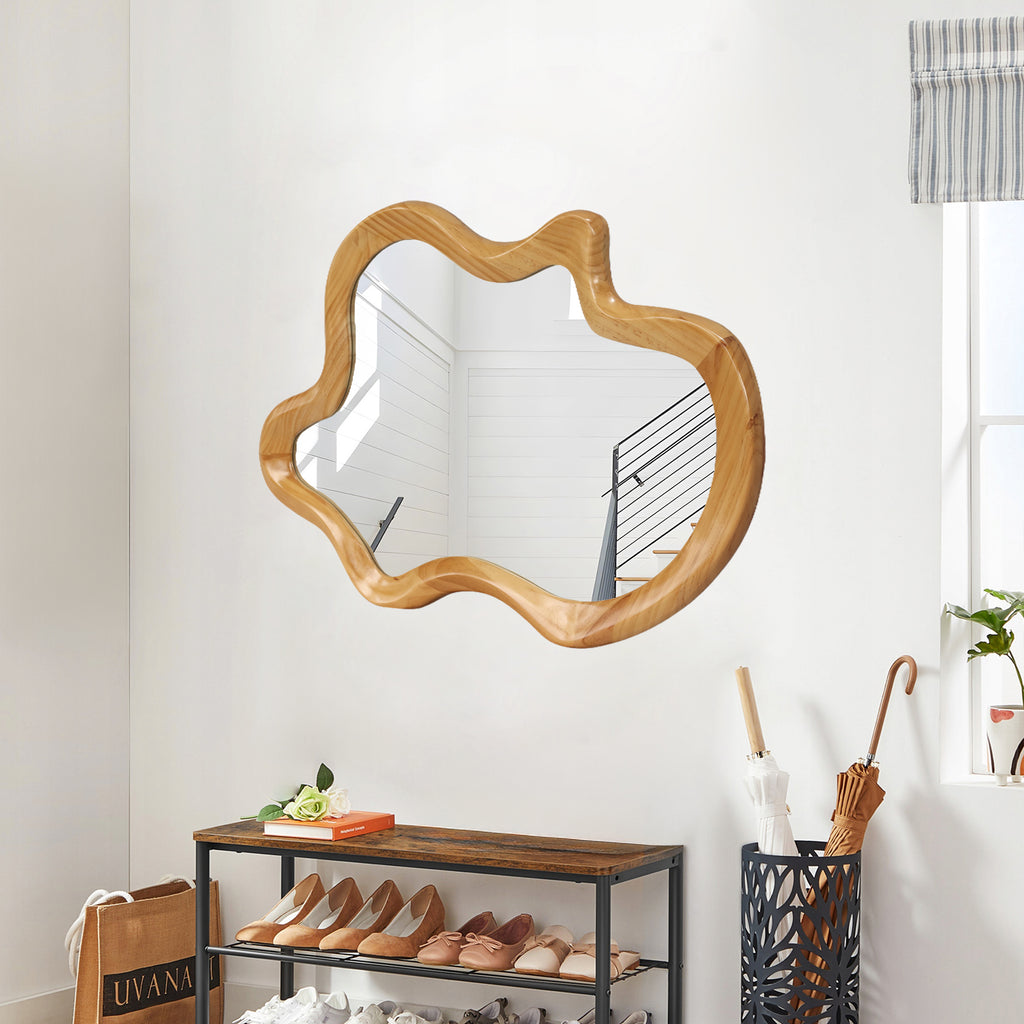Anthony & Home wall mirror with natural wood frame and irregular silhouette, showcasing a modern, artistic design.
