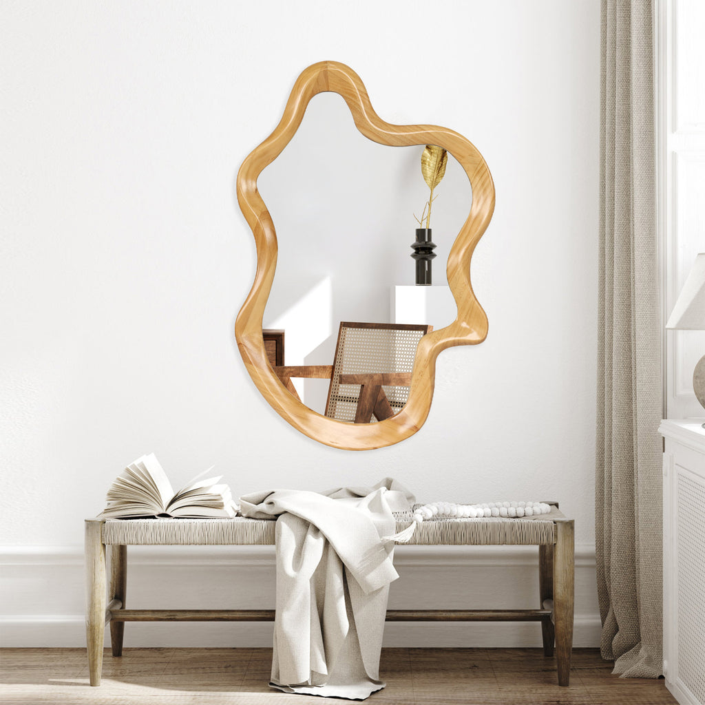 Anthony & Home wall mirror with natural wood frame featuring an irregular silhouette, showcasing a modern, artistic design.