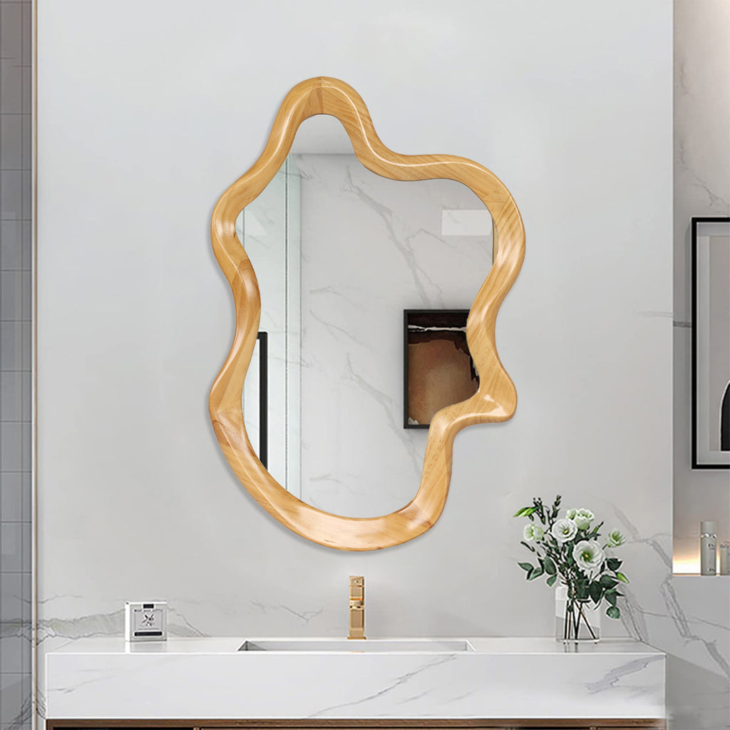 Wall mirror with natural wood frame and irregular silhouette by Anthony & Home, showcasing a stylish, organic design.