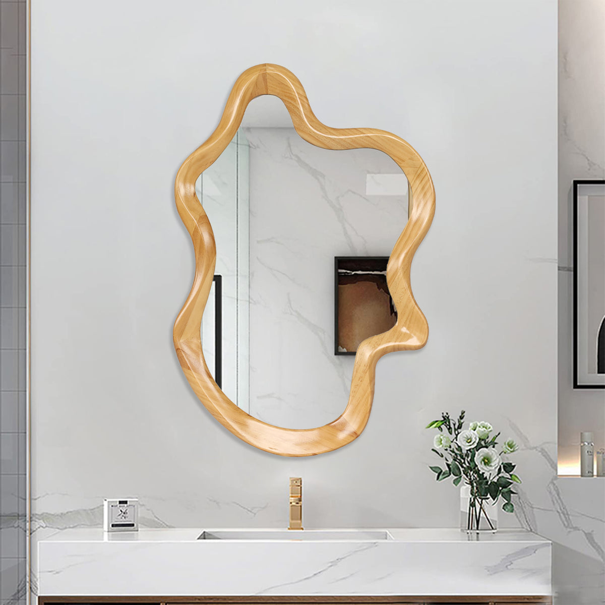 Wall mirror with natural wood frame and irregular silhouette by Anthony & Home, showcasing a stylish, organic design.