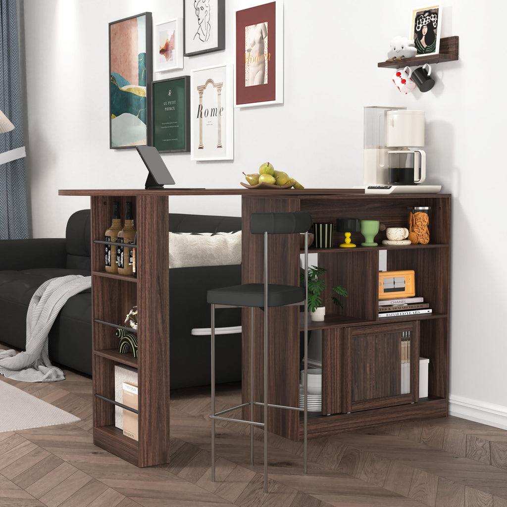 Walnut bar cabinet with rotating top, six storage compartments, and ribbed glass doors from Anthony & Home Atelier Collection.