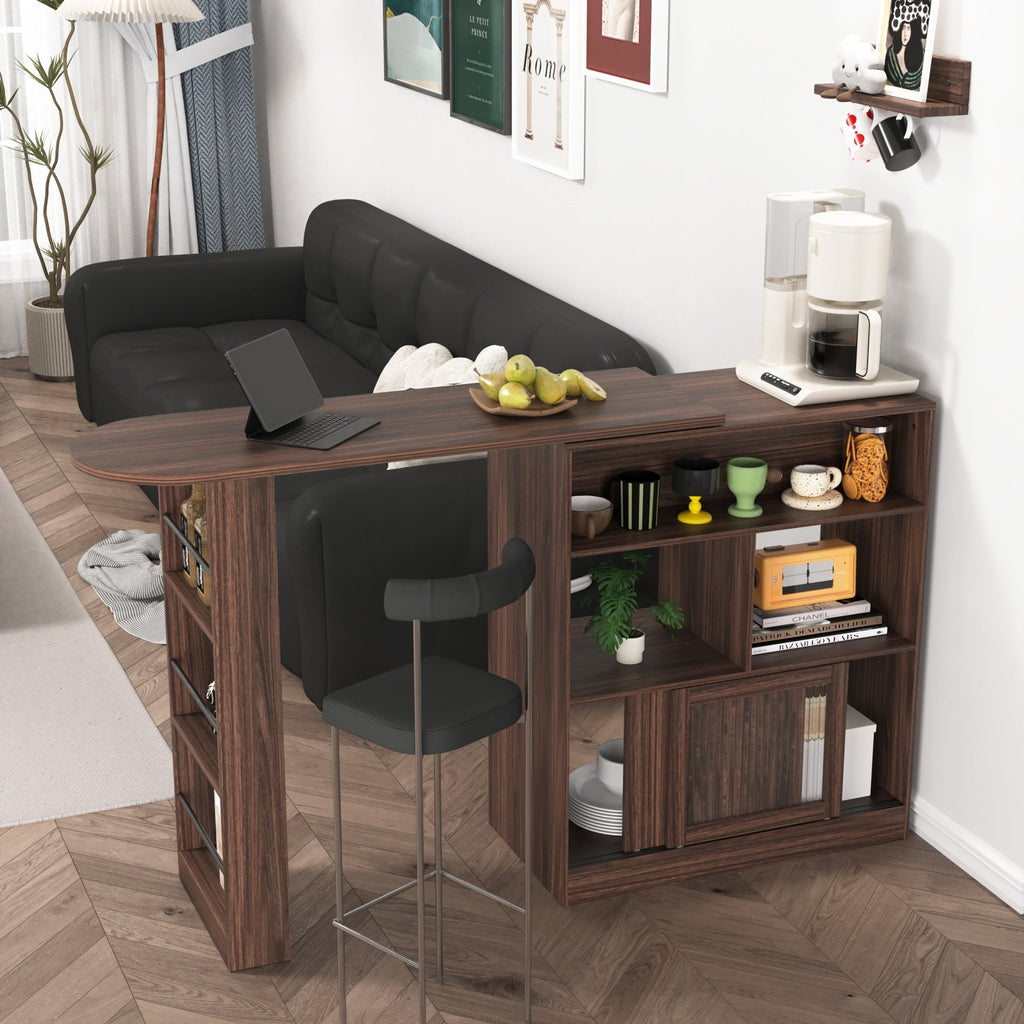 Walnut bar cabinet with ribbed glass doors, rotating top, and six storage compartments from Anthony & Home Atelier Collection.