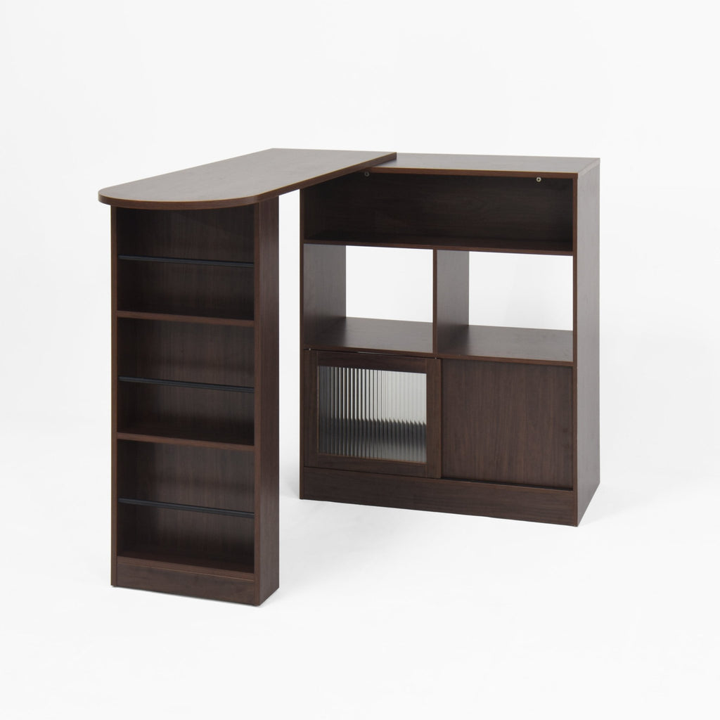 Anthony & Home Walnut bar cabinet with rotating top and six storage compartments, ribbed glass doors, part of the Atelier Collection.