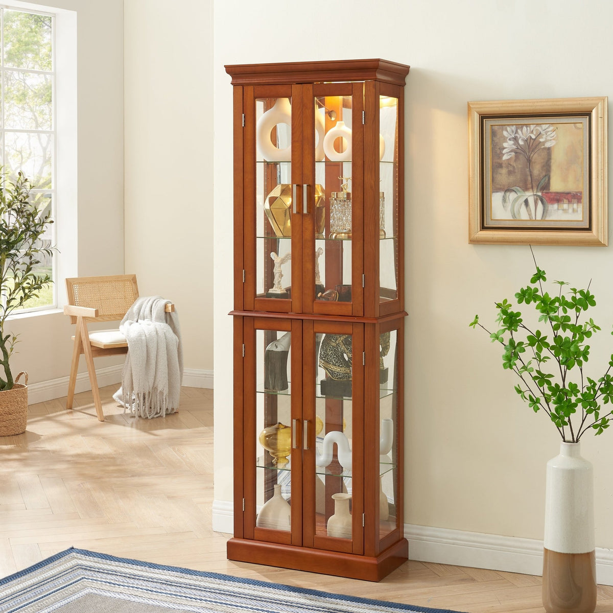Walnut finish lighted curio cabinet with mirrored back and glass shelves, showcasing elegant display storage by Anthony & Home