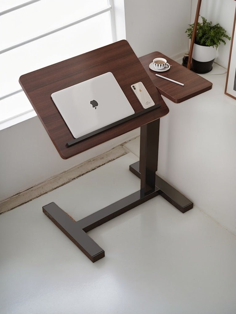 Walnut folding overbed table by Anthony & Home with a sleek wooden surface and adjustable legs for versatile use.