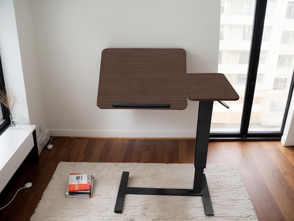 Walnut folding overbed table by Anthony & Home with a sturdy wooden surface and adjustable legs for versatile use.