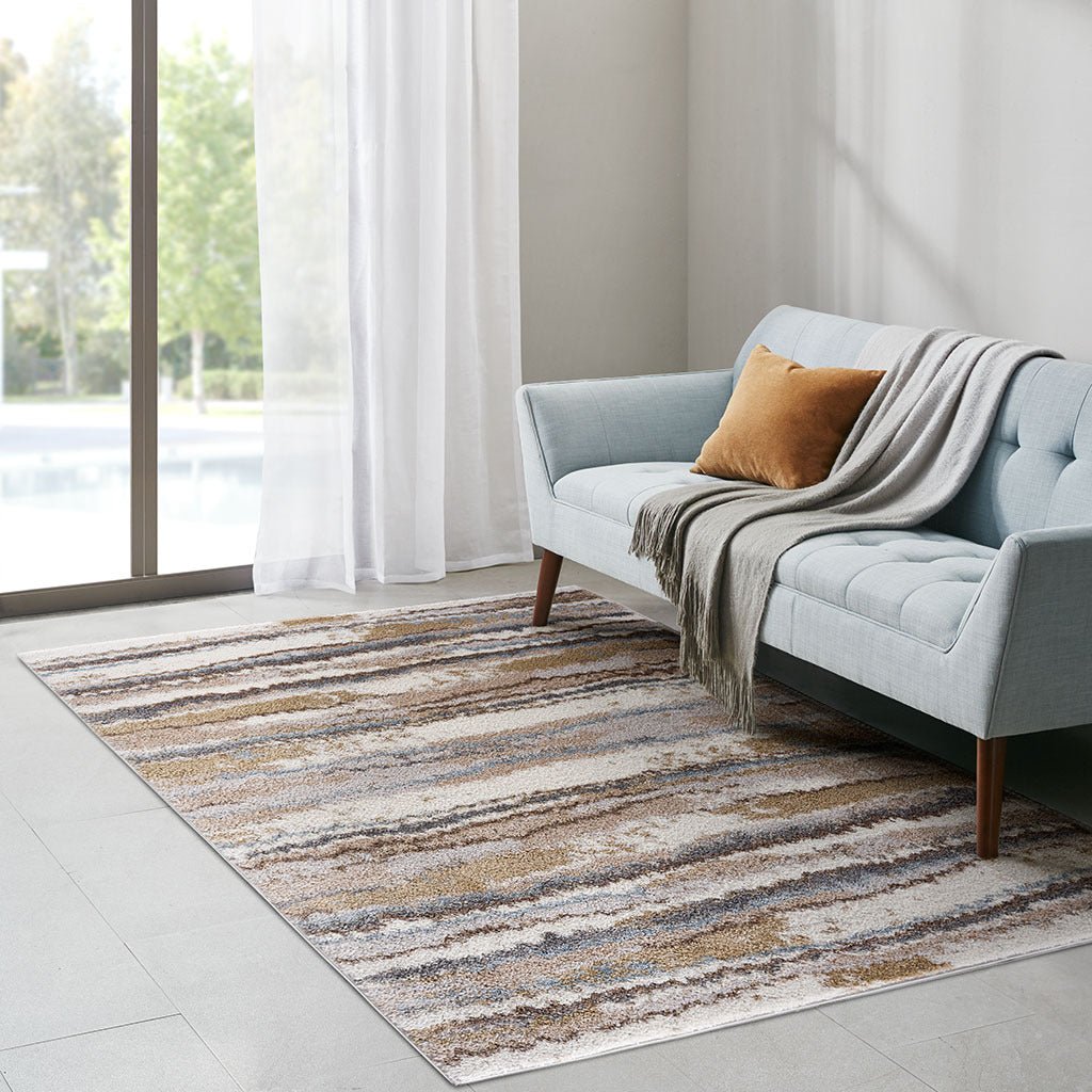 Watercolor stripe woven area rug by Anthony & Home featuring vibrant Turkish Atelier design with colorful, textured woven fabric.