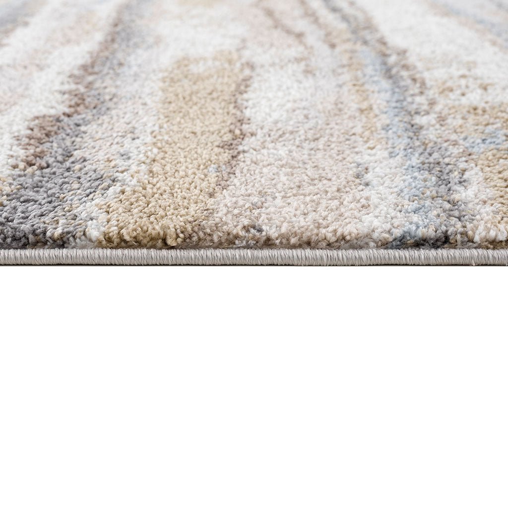 Watercolor stripe woven area rug by Anthony & Home featuring vibrant Turkish-inspired watercolor stripe design on textured fabric.