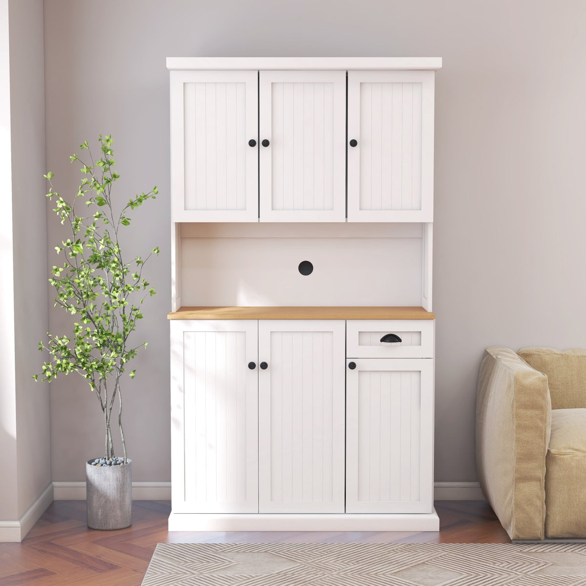 White freestanding kitchen pantry hutch from Anthony & Home with cabinets and open shelving for kitchen storage.