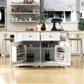 White kitchen island from Anthony & Home's Atelier Collection with a spacious countertop and storage cabinets.