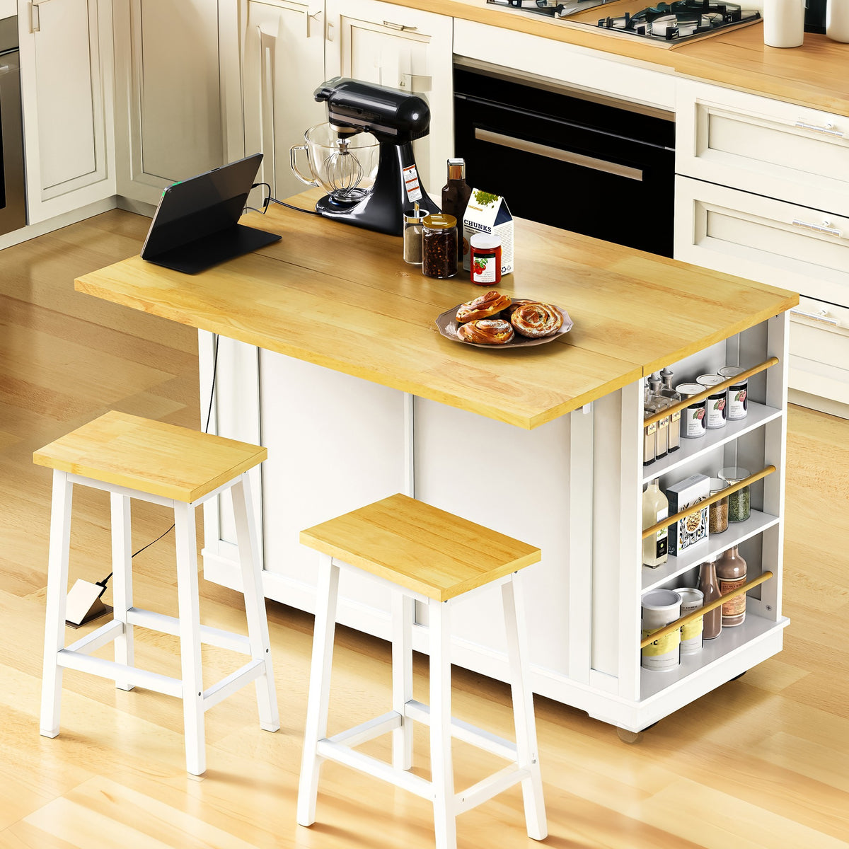 White Kitchen Island from the Anthony & Home Atelier Collection, featuring a spacious surface and storage drawers.