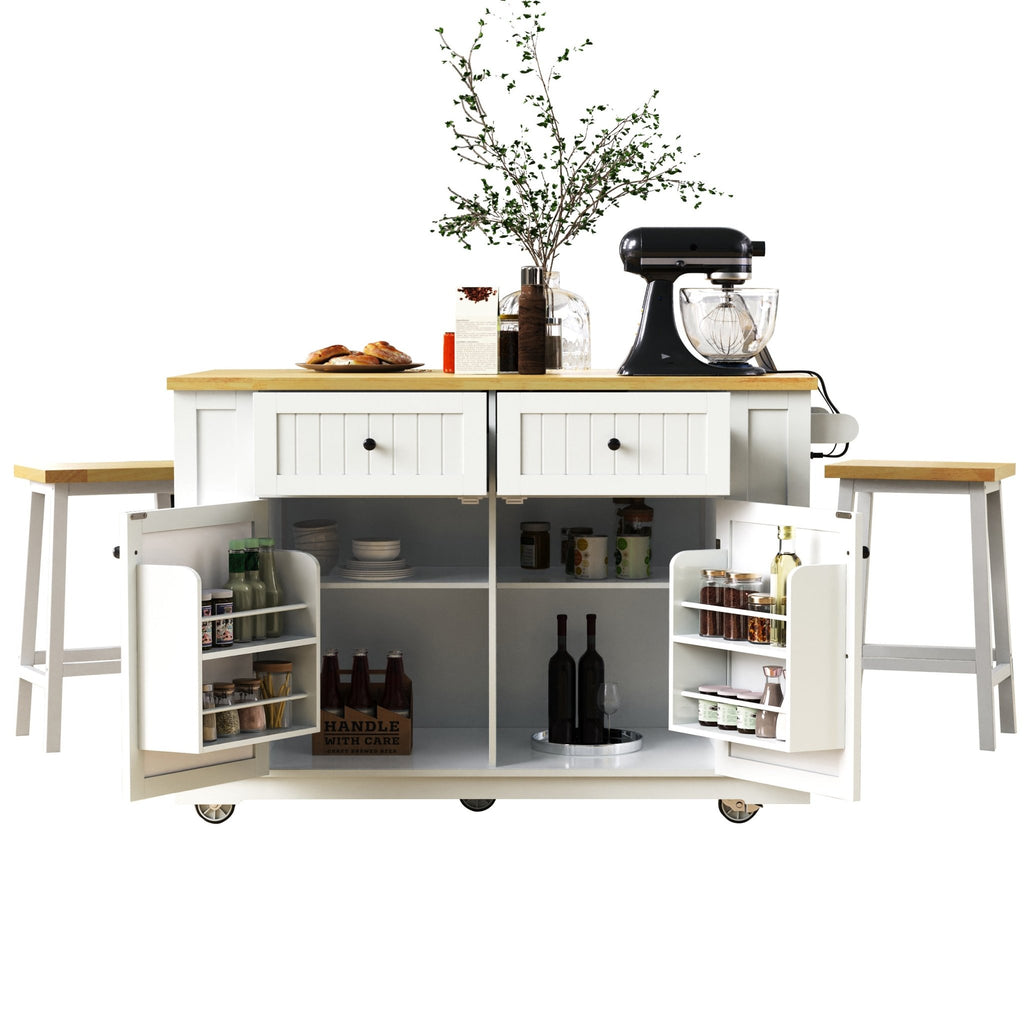 White kitchen island from the Atelier Collection by Anthony & Home, featuring a spacious countertop and storage drawers.