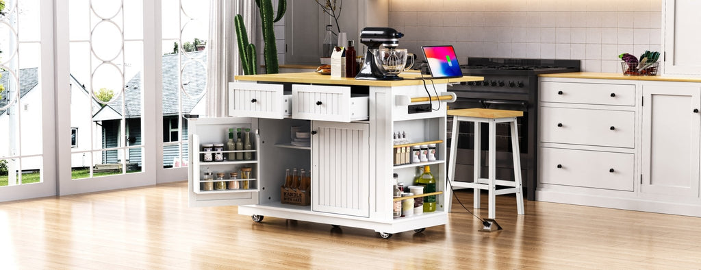 White Anthony & Home Kitchen Island from the Atelier Collection, featuring a spacious surface and storage cabinets.