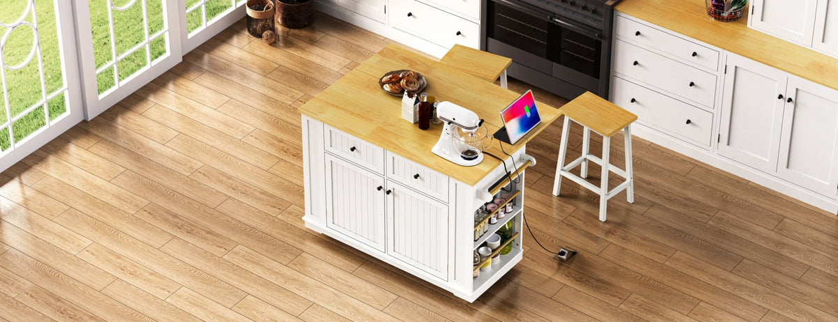 White Kitchen Island from the Atelier Collection by Anthony & Home, featuring a spacious top and storage cabinets.
