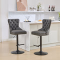 Set of two Anthony & Home tufted PU leather bar stools with adjustable height and modern design, 26-33 inches tall.