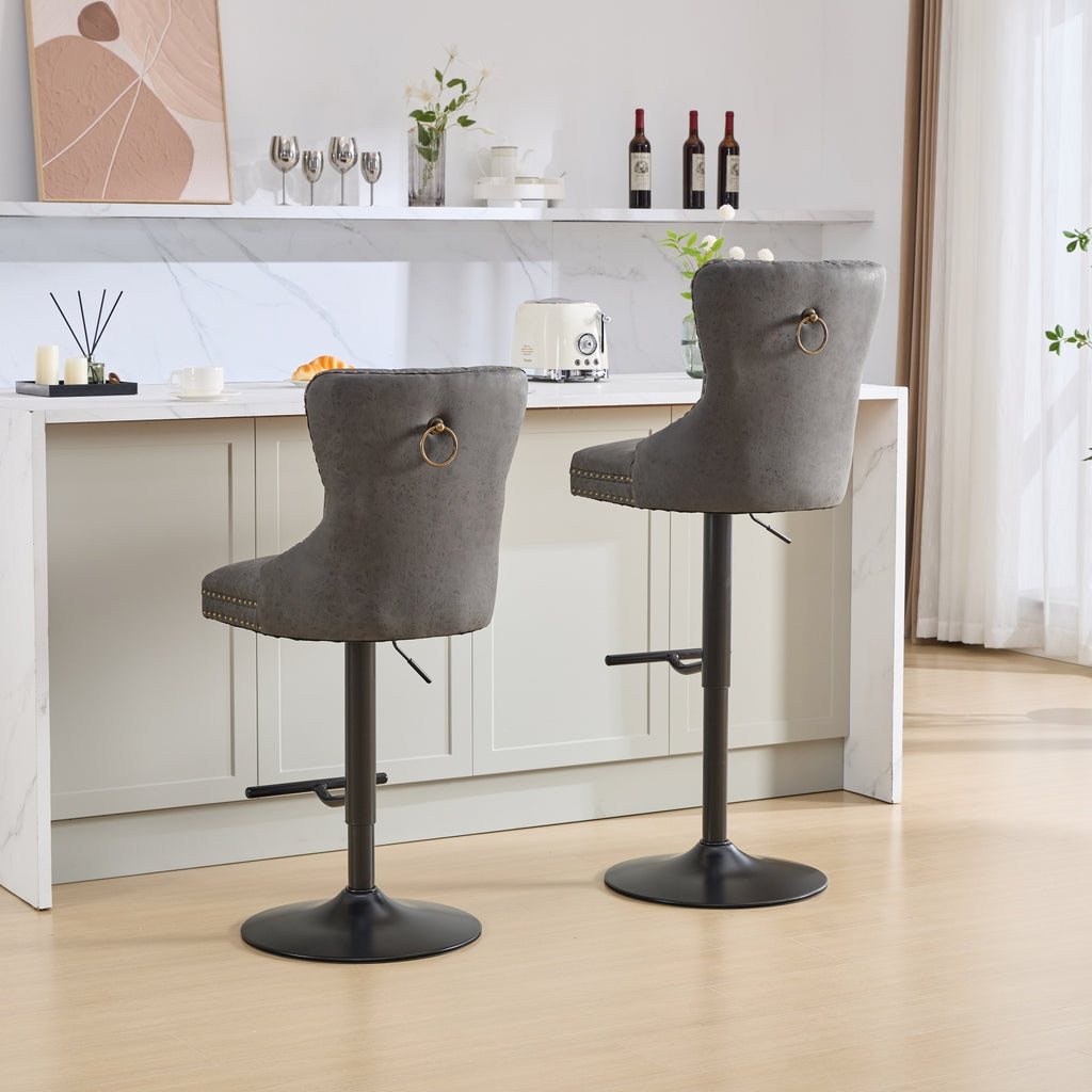 Set of two Anthony & Home tufted PU leather bar stools with adjustable heights, 26-33 inches, featuring a modern design.