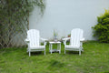 White Virgin HDPE folding Adirondack chair and side table set by Anthony & Home, ideal for outdoor relaxation and patio decor.