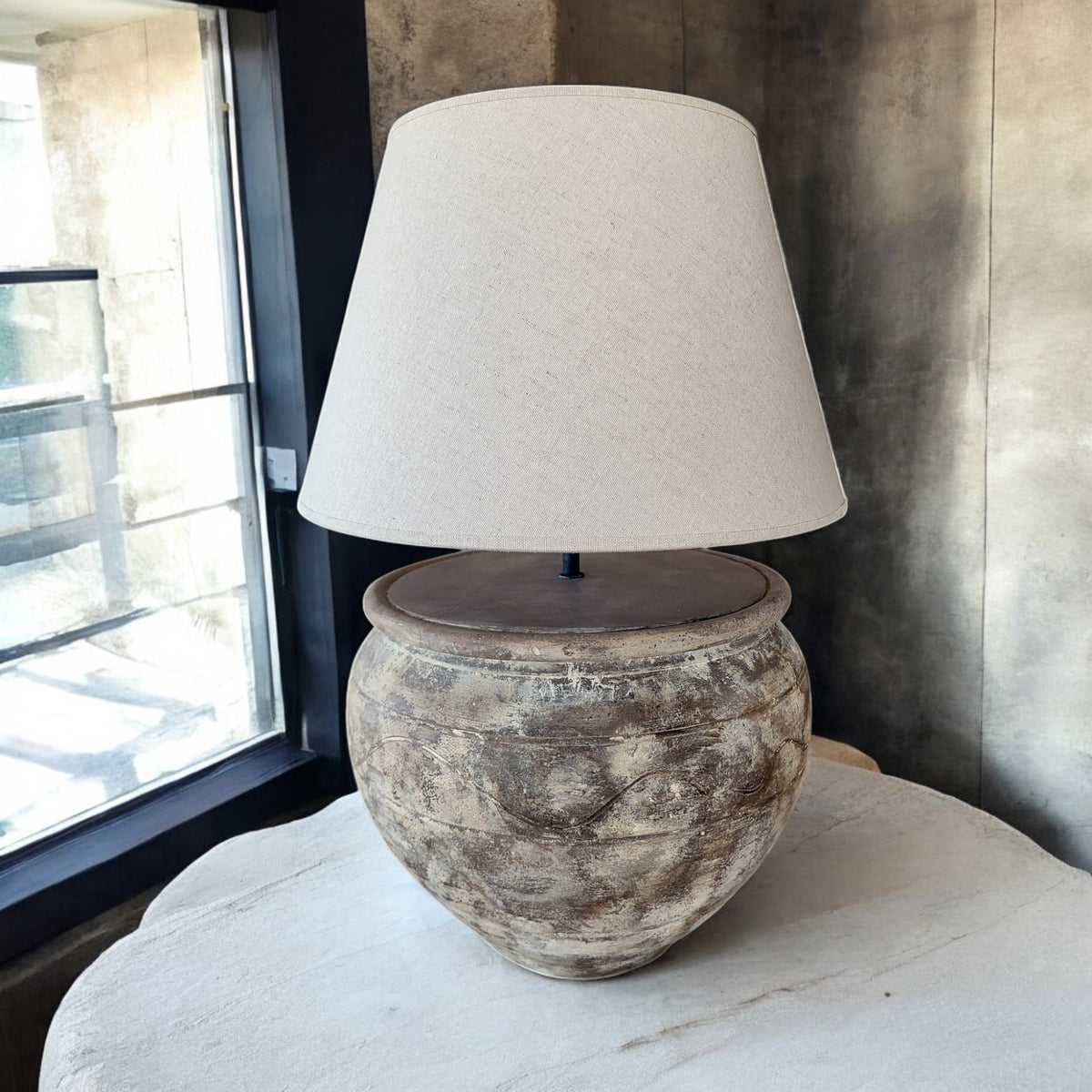 ArtisanbyMF limited edition terracotta LV39 table lamp with a sleek, modern design and warm finish, ideal for contemporary home decor.