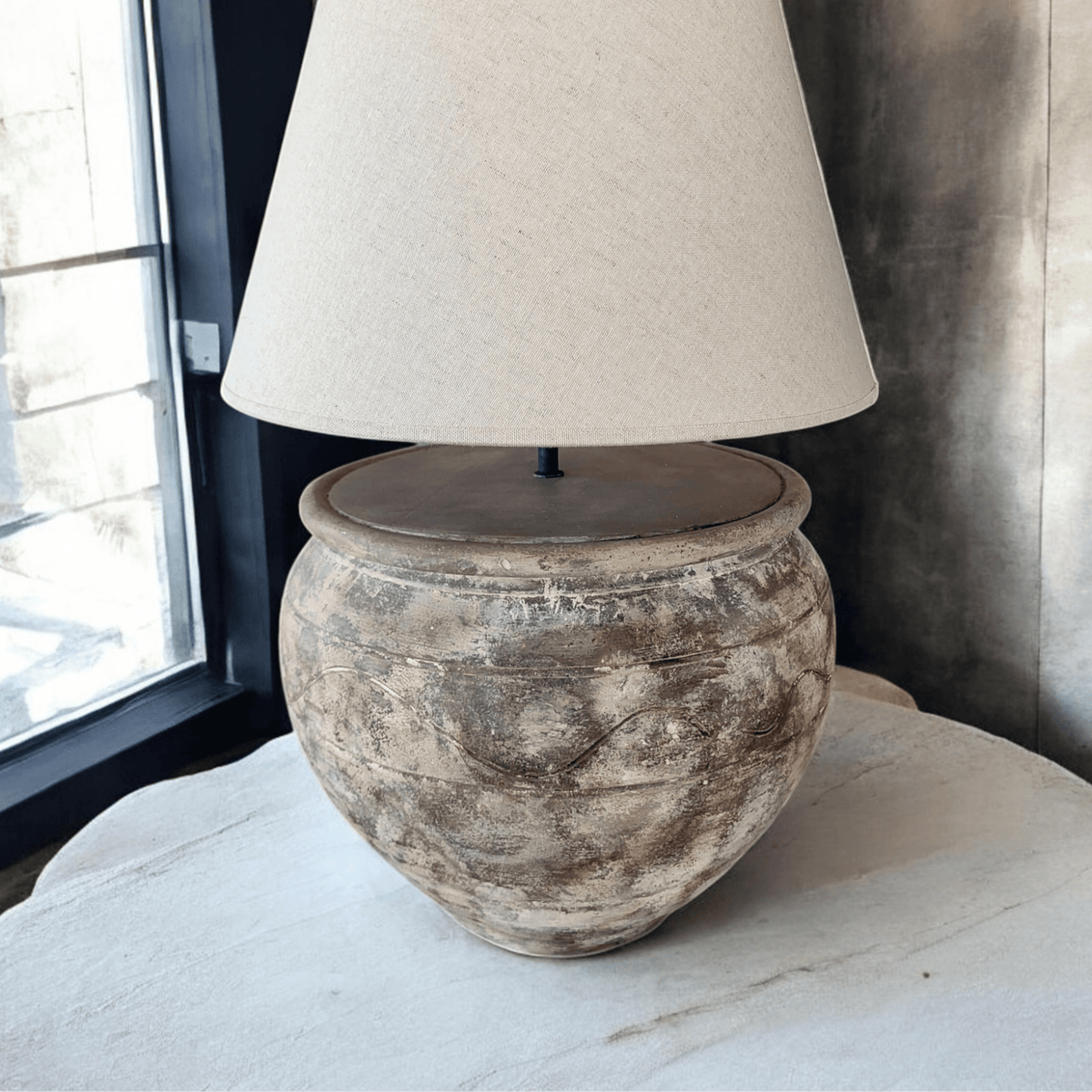 ArtisanbyMF Terracotta LV39 limited edition table lamp with a warm, textured terracotta finish and modern design.