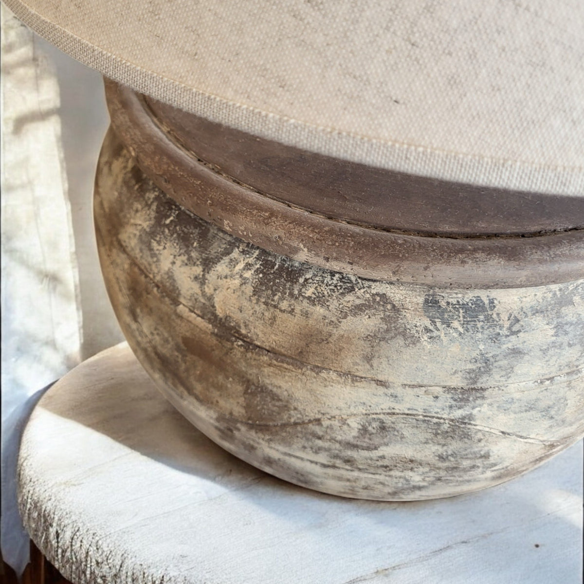 ArtisanbyMF Terracotta LV39 Limited Edition table lamp with a warm terracotta finish and modern design, shown on a side table.