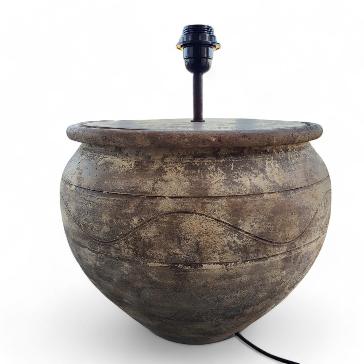 ArtisanbyMF Terracotta LV39 table lamp with a textured ceramic base and a neutral fabric lampshade on a wooden surface.