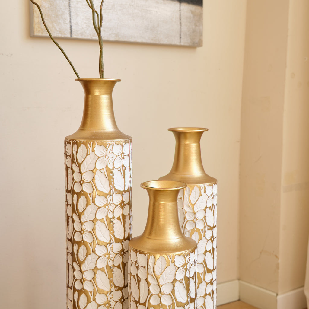 Heritage Collection floor vase trio by Anthony & Home, featuring elegant ceramic vases in varying sizes with intricate patterns.