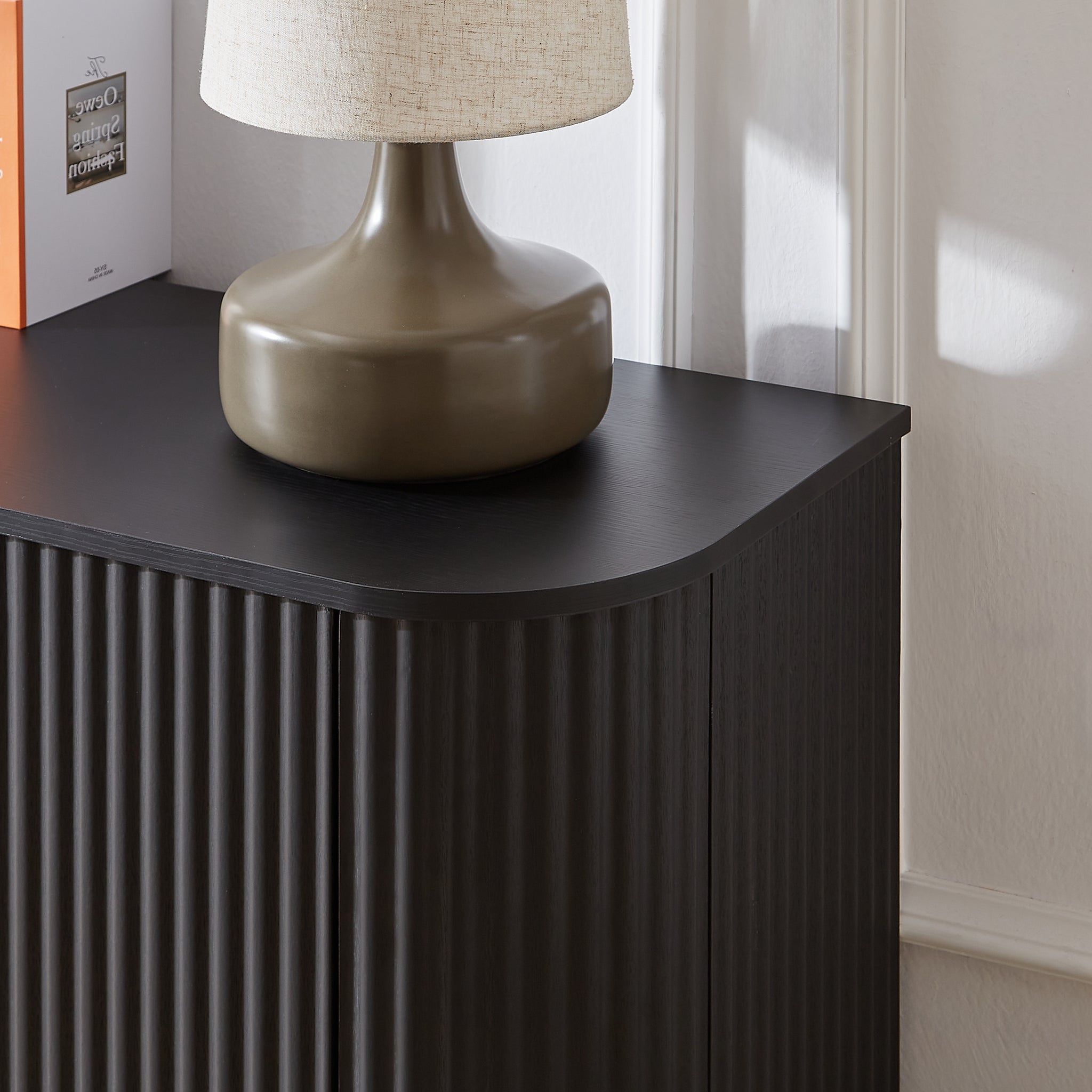 Black wood sideboard TV stand with a wave pattern design from Anthony & Home, featuring a sleek modern style.