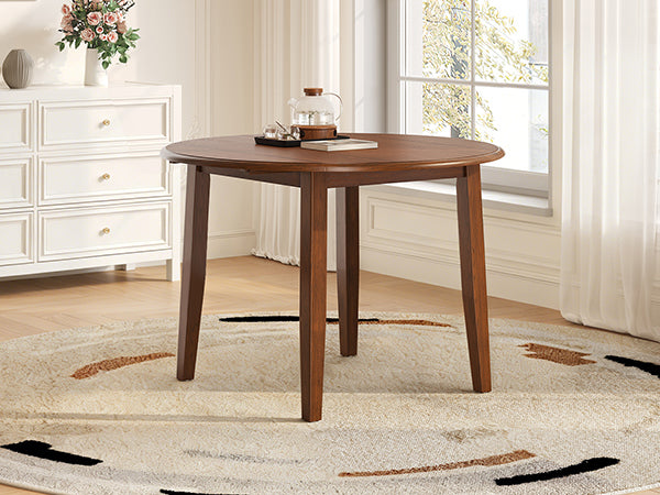 Anthony & Home Atelier Walnut Extendable Round Dining Table set with 2-4 seats, showcasing the elegant wooden surface and extendable design.