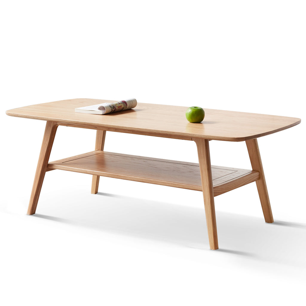 Natural oak coffee table with storage shelf from Anthony & Home's Atelier Collection, showcasing a sleek, timeless design.