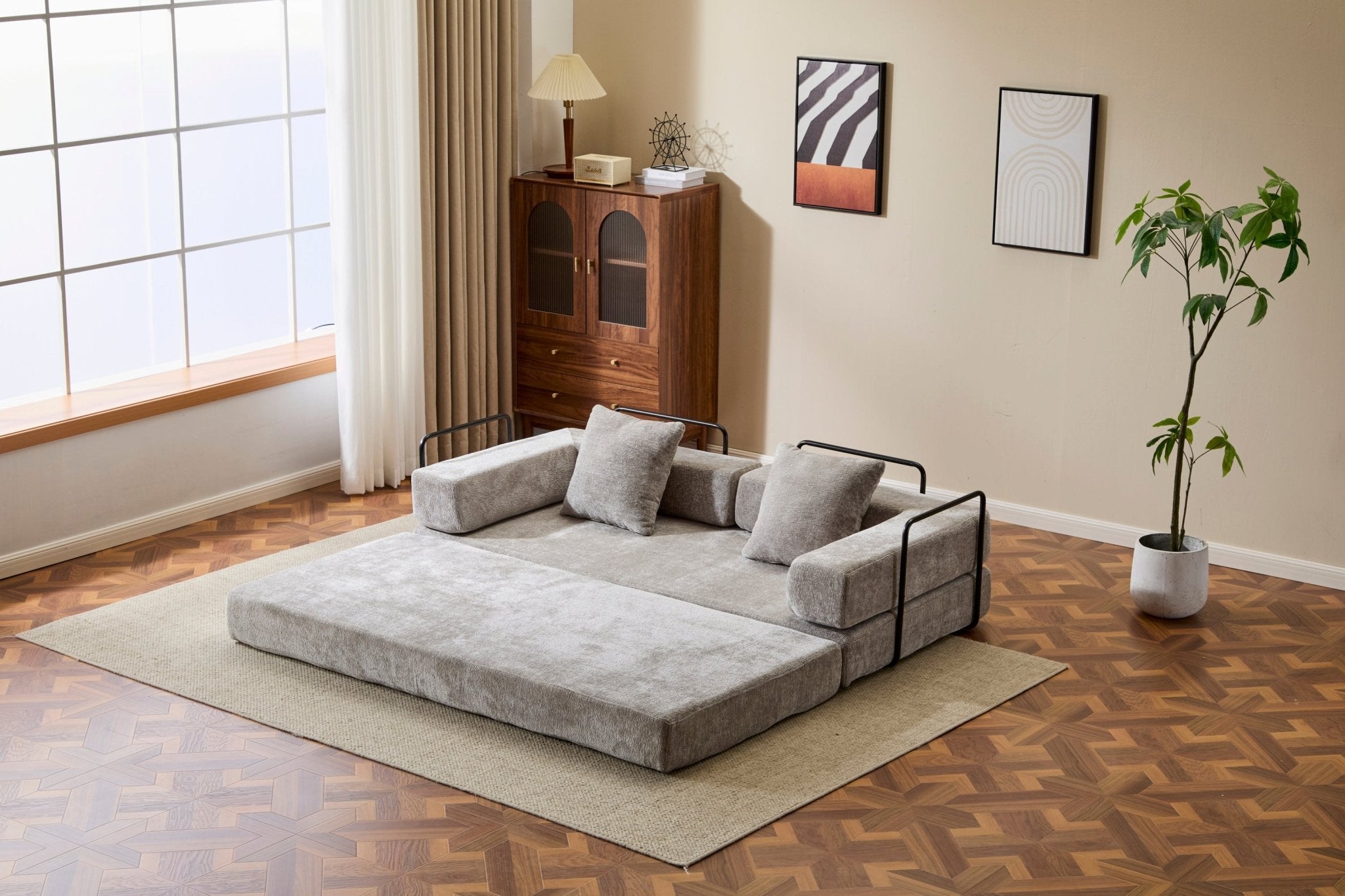Light grey convertible chenille sofa bed with pillow back by Anthony & Home, showcasing a modern, comfortable living room setup.