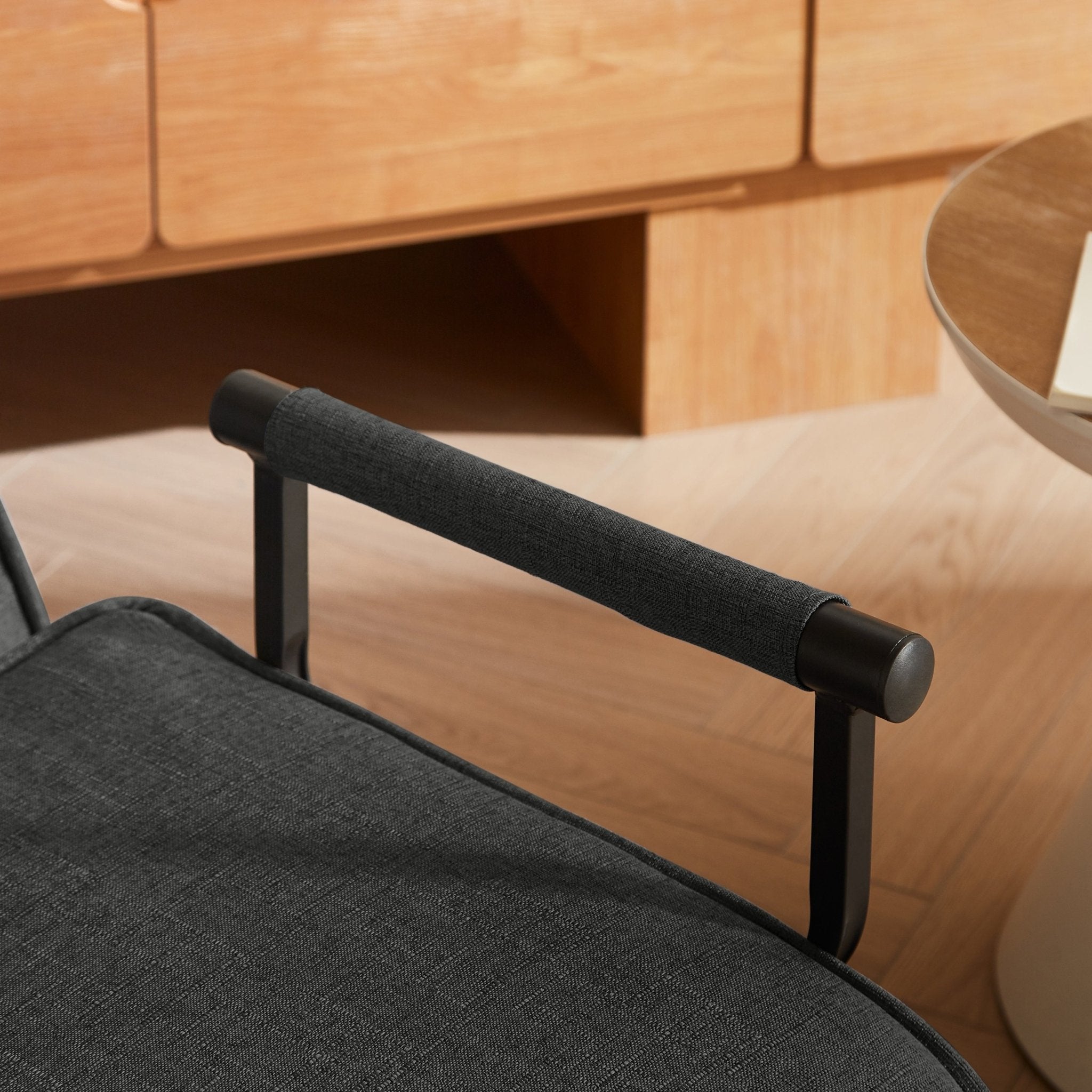 Black linen Sleep Chair Bed in 5-position design by Anthony & Home, showcasing its versatile, comfortable lounging and sleeping features.