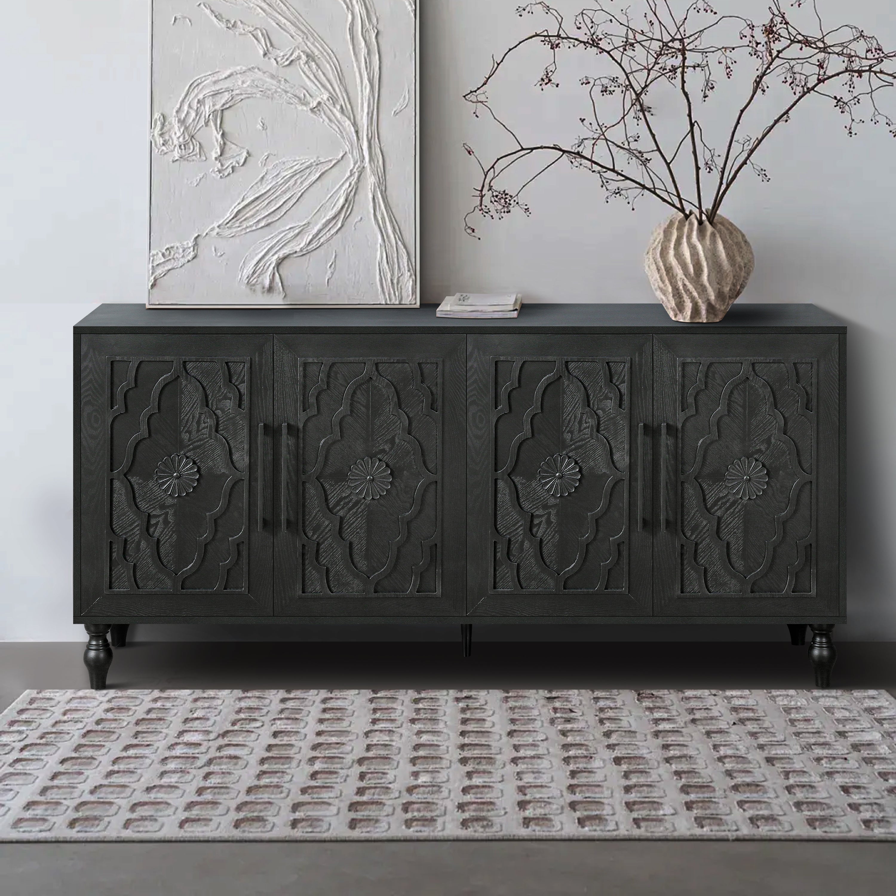 Black carved flower door storage cabinet by Anthony & Home with metal handle, suitable for living room, kitchen, or entryway.